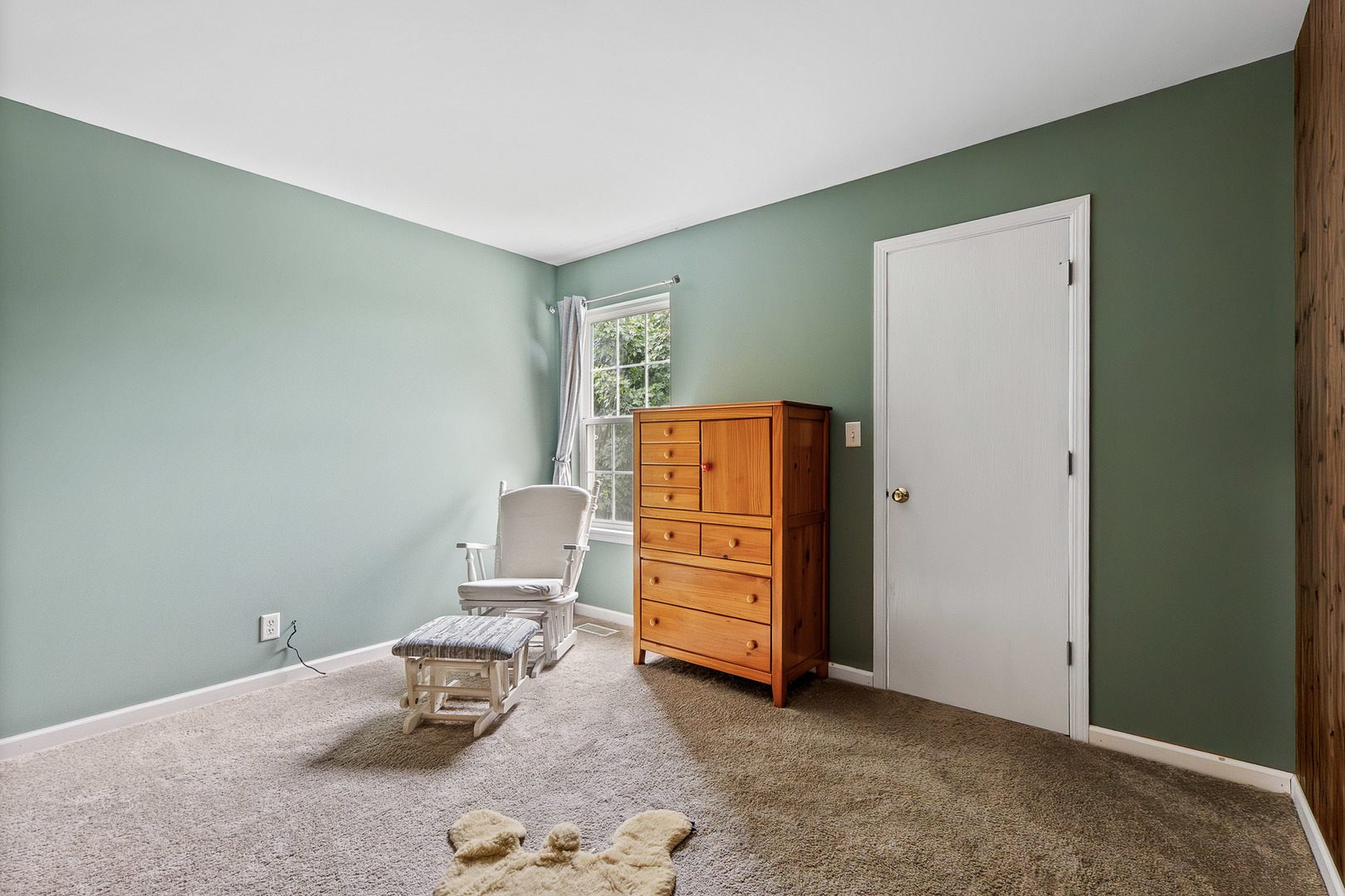 712 Wilson Street Waterman, IL 60556 - Photo 16 of 24 a room with furniture and a dresser
