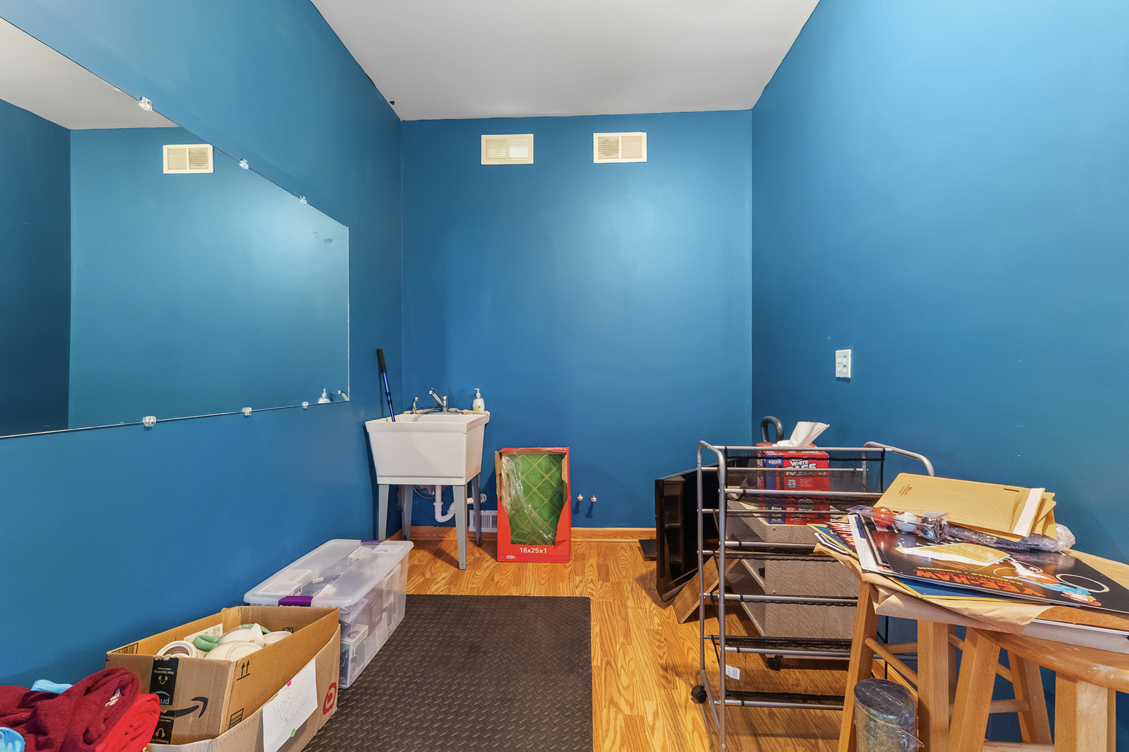 712 Wilson Street Waterman, IL 60556 - Photo 19 of 24 a bedroom with a bed and a table in it