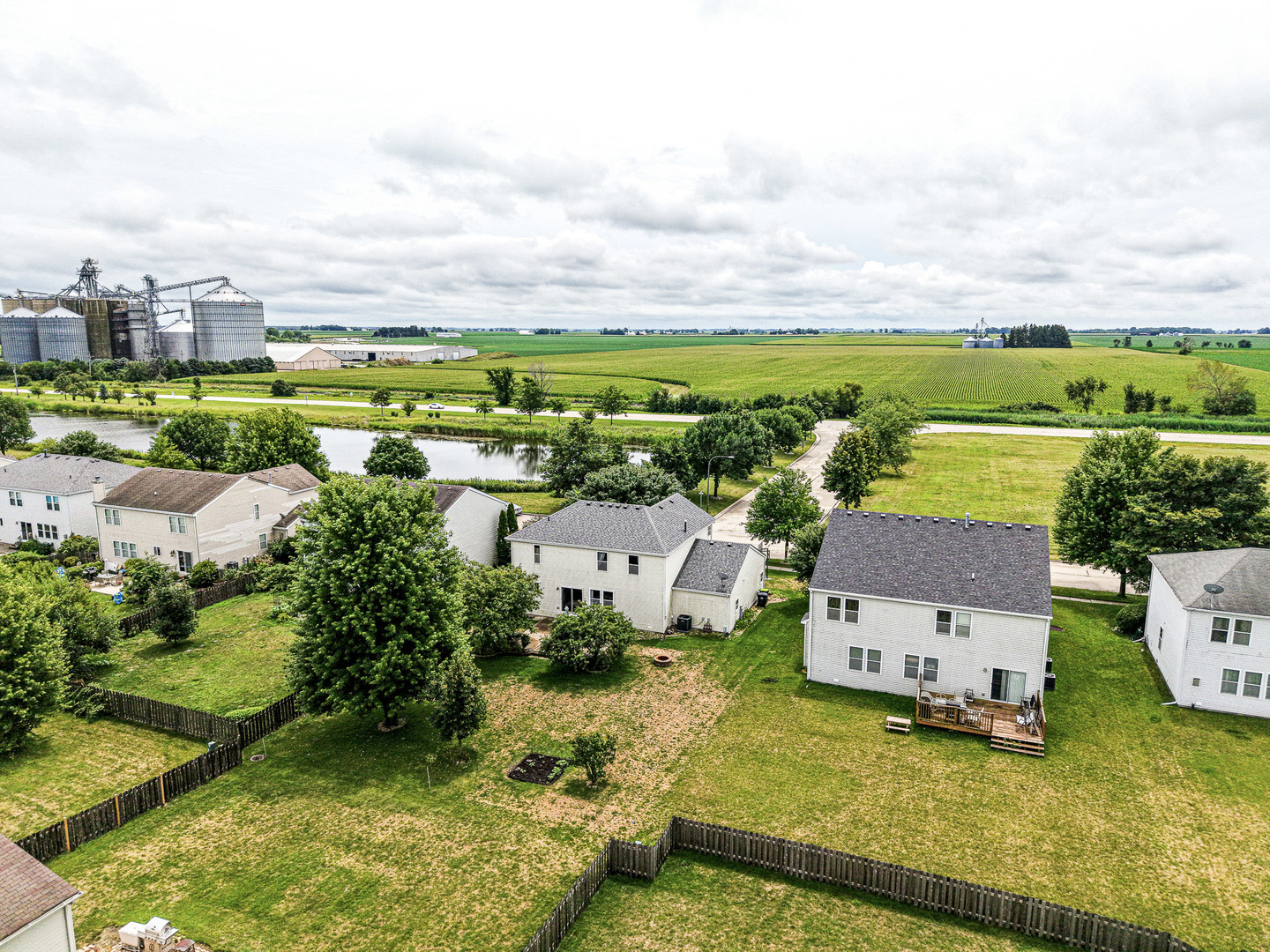 712 Wilson Street Waterman, IL 60556 - Photo 21 of 24 an aerial view of a house with a garden