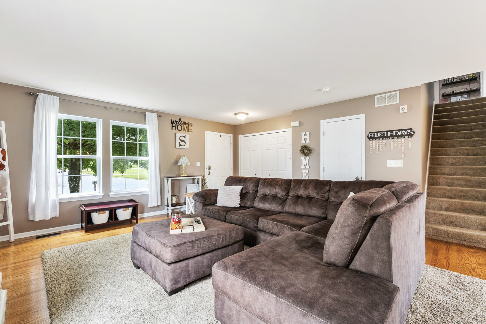 712 Wilson Street Waterman, IL 60556 - Photo 3 of 24 a living room with furniture and a large window
