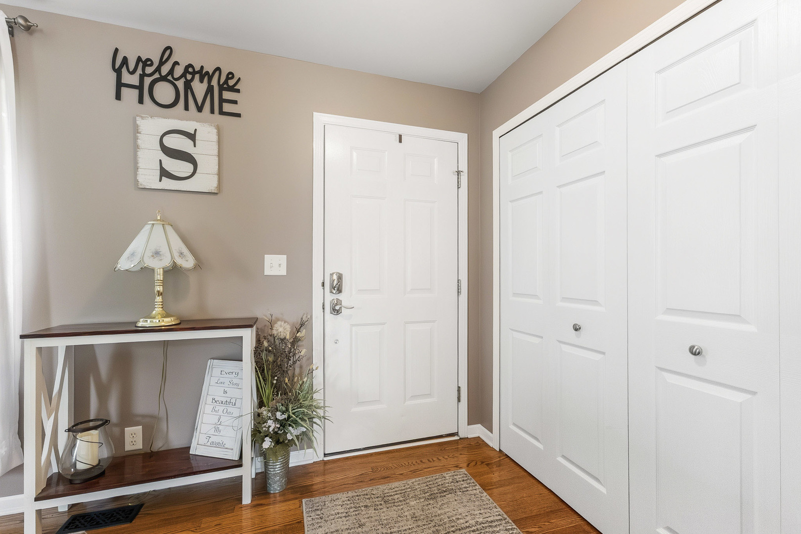 712 Wilson Street Waterman, IL 60556 - Photo 4 of 24 a view of gallery with wooden floor