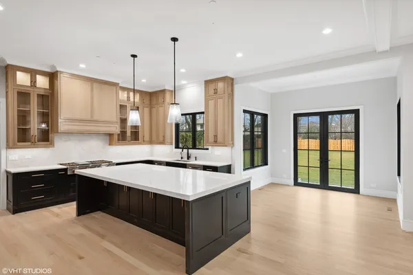 a kitchen with a sink and window