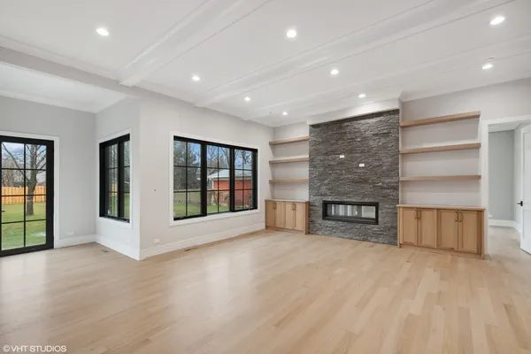 a large kitchen with stainless steel appliances kitchen island a large island in the center