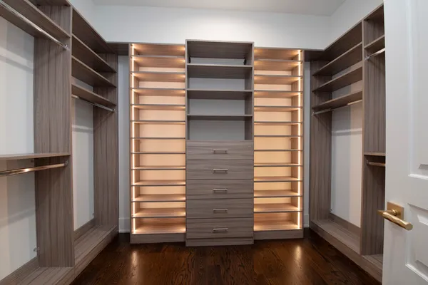 a living room with furniture and a bathroom