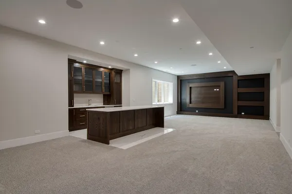a utility room with sink dryer and washer