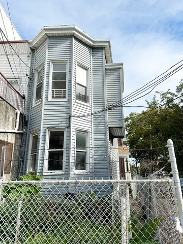 a house that has a window in front of it