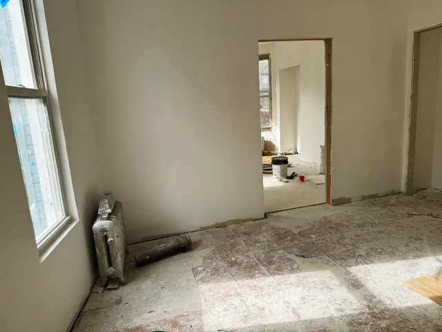 a view of empty room with windows