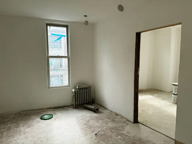 an empty room with windows
