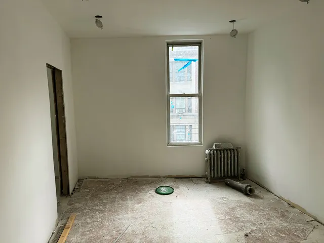 an empty room with windows