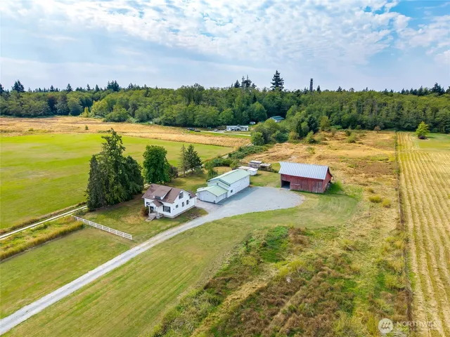a view of a lake with a yard
