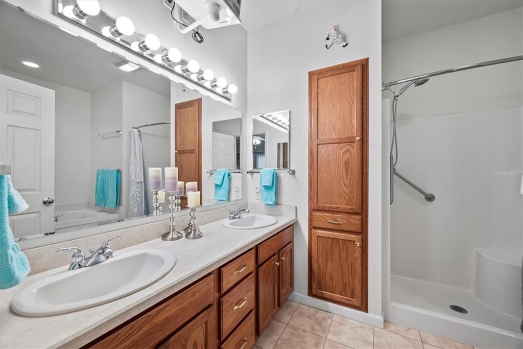 509 Madison Boulevard Freedom, PA 15042 - Photo 17 of 41 a bathroom with a double vanity sink mirror and double