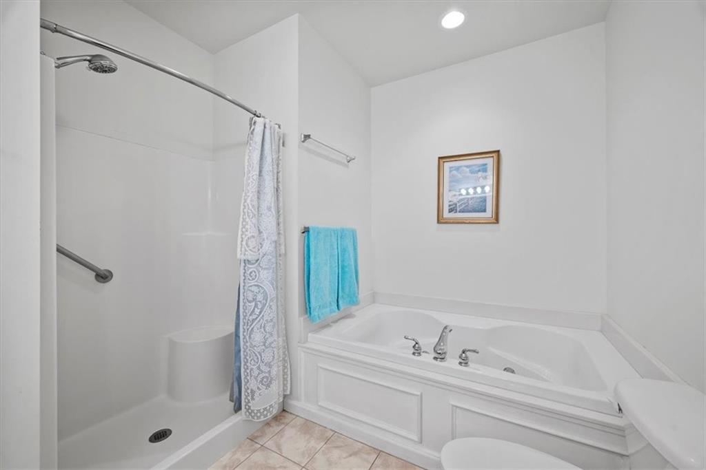 509 Madison Boulevard Freedom, PA 15042 - Photo 18 of 41 a bathroom with a tub a shower and a sink