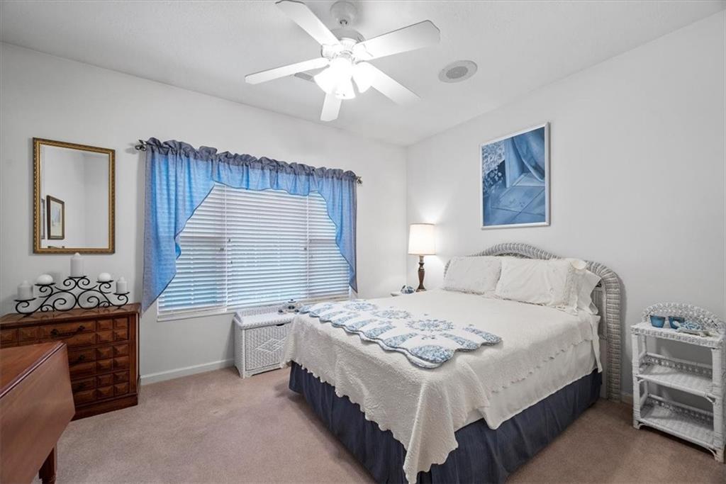 509 Madison Boulevard Freedom, PA 15042 - Photo 24 of 41 a bedroom with a bed and a chandelier