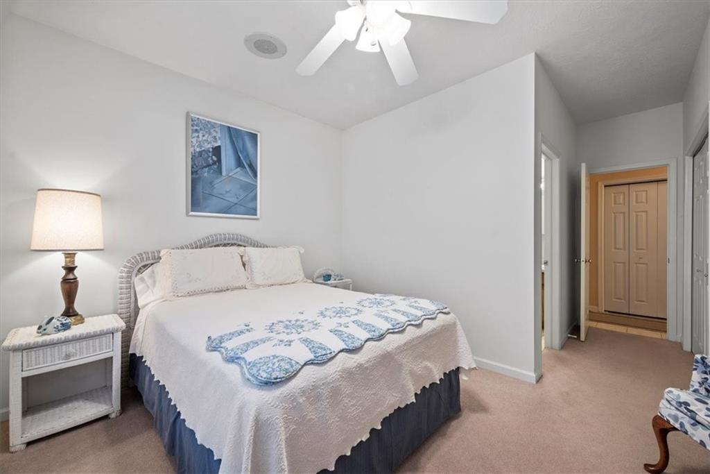 509 Madison Boulevard Freedom, PA 15042 - Photo 25 of 41 a bedroom with a bed and a lamp