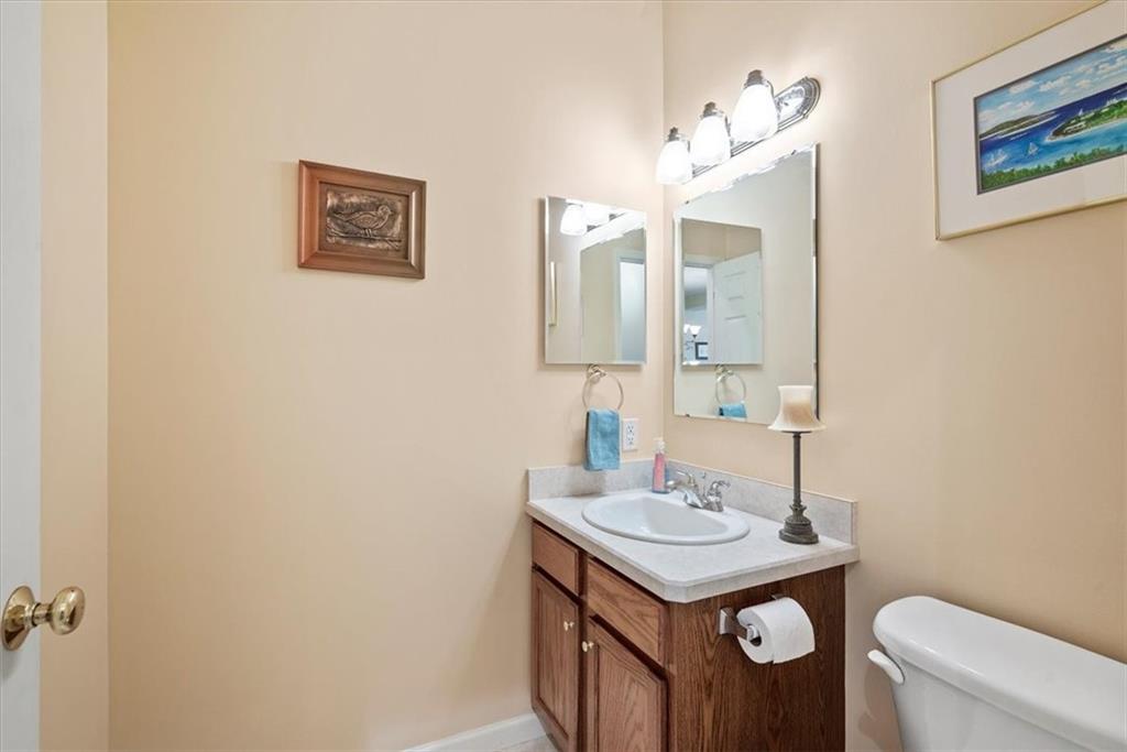 509 Madison Boulevard Freedom, PA 15042 - Photo 28 of 41 a bathroom with a sink mirror and toilet