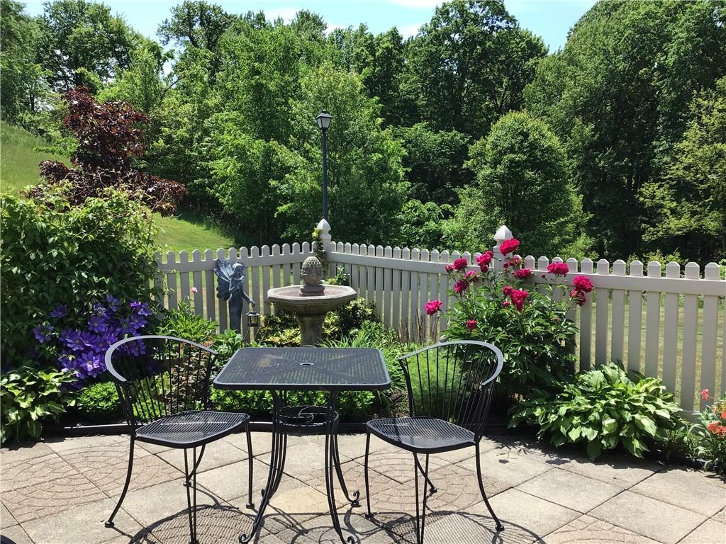 509 Madison Boulevard Freedom, PA 15042 - Photo 39 of 41 a view of a chairs and table in a backyard