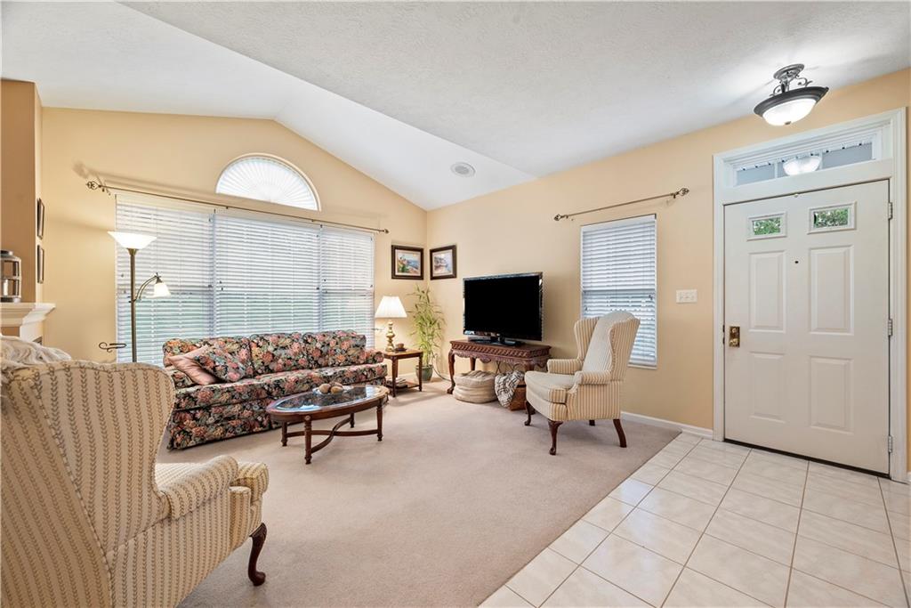 509 Madison Boulevard Freedom, PA 15042 - Photo 4 of 41 a living room with furniture and a flat screen tv
