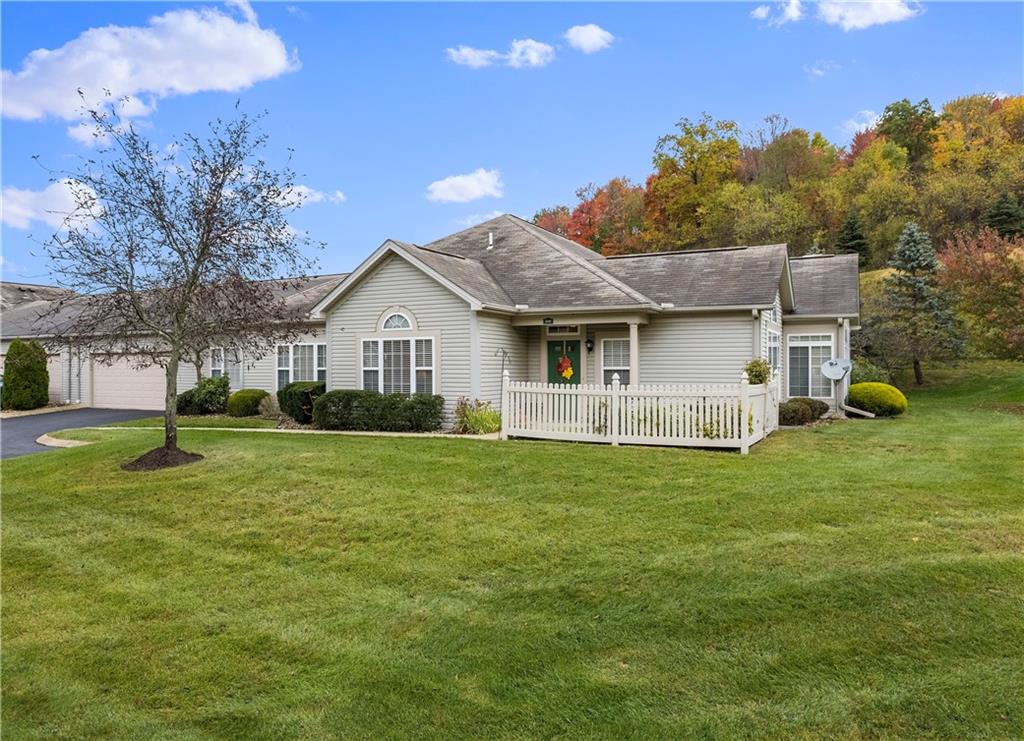509 Madison Boulevard Freedom, PA 15042 - Photo 41 of 41 a view of a house with a big yard and large trees