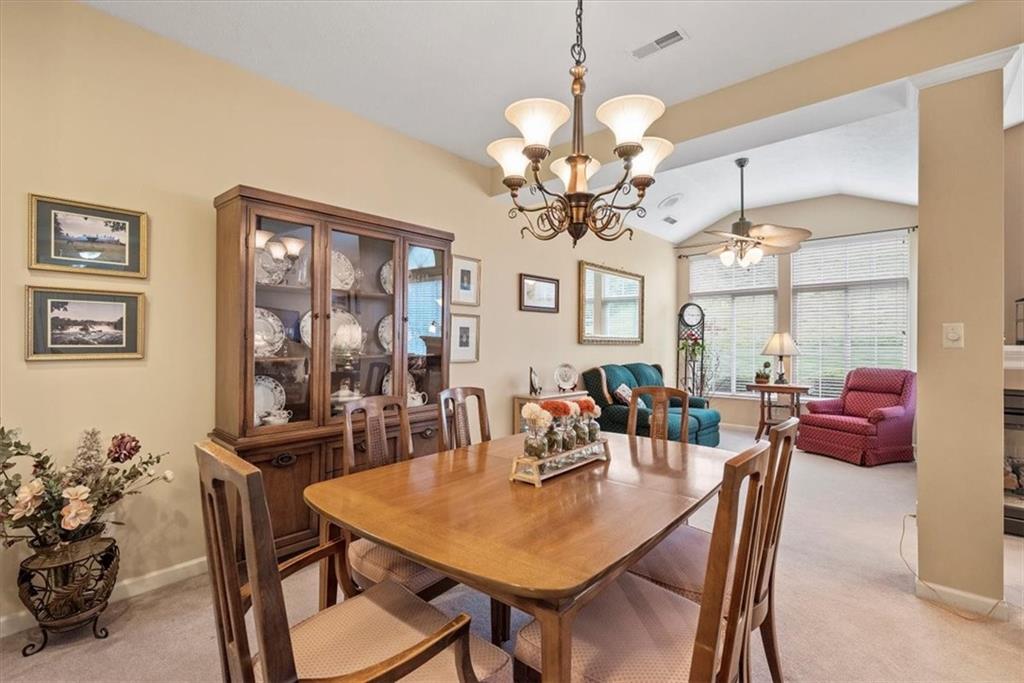 509 Madison Boulevard Freedom, PA 15042 - Photo 7 of 41 a view of a dining room with furniture wooden floor and chandelier