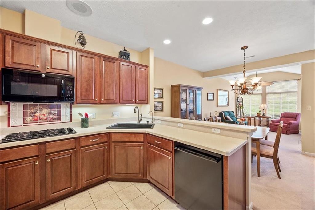 509 Madison Boulevard Freedom, PA 15042 - Photo 8 of 41 a kitchen with a sink stove and microwave