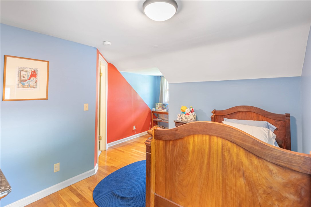 156 West Hadley Road Dayton, OH 45419 - Photo 34 of 71 This cozy bedroom features polished wood floors and vibrant walls.