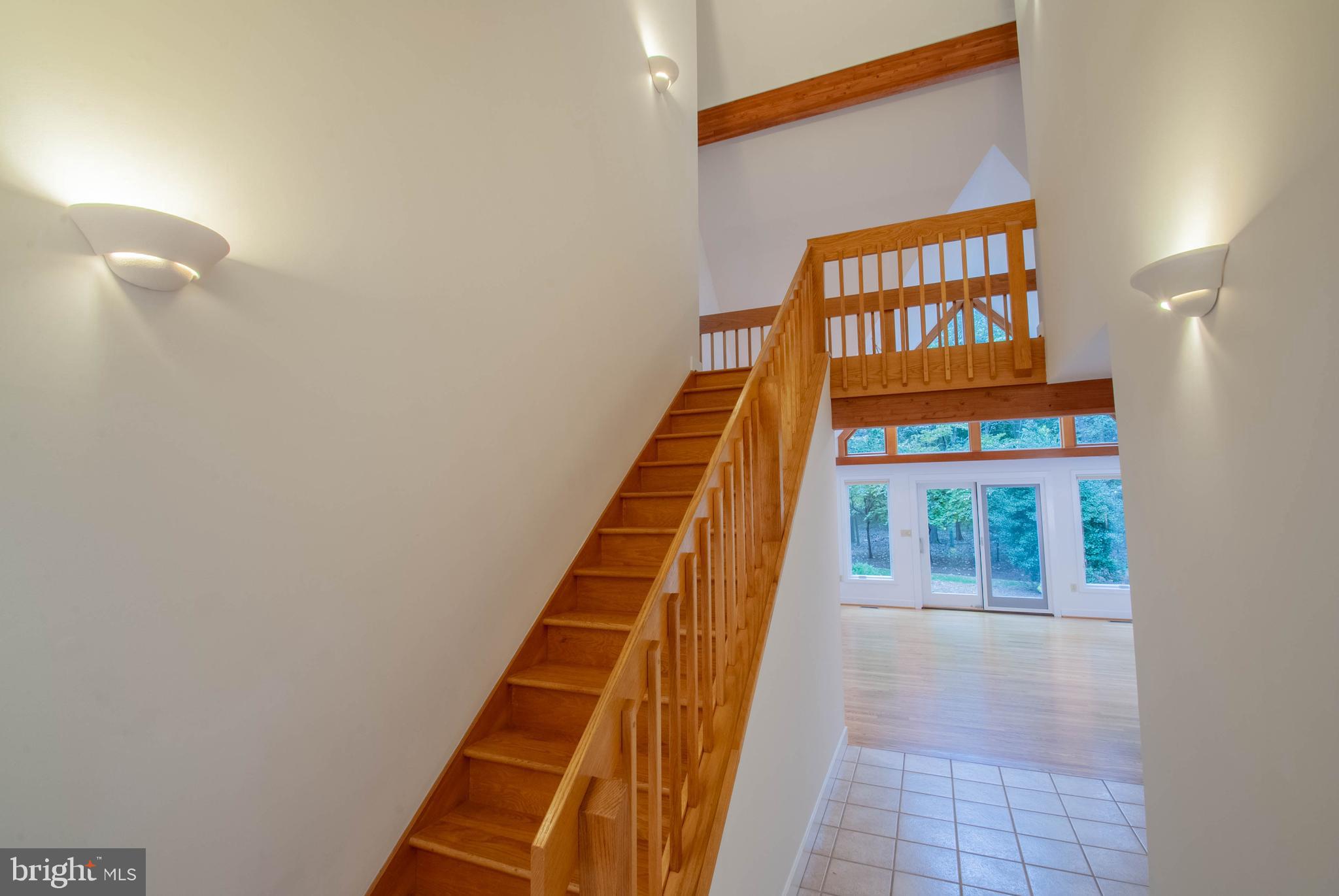 3672 Thomas Point Road Annapolis, MD 21403 - Photo 31 of 57 staircase to upper level