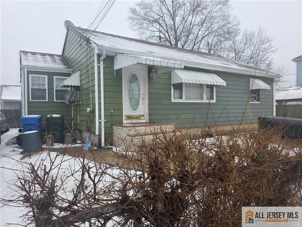 8 Beech Street Fords, NJ 08863 - Photo 2 of 2 a view of a house with yard and sitting area