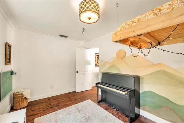 a living room with a stove and a table