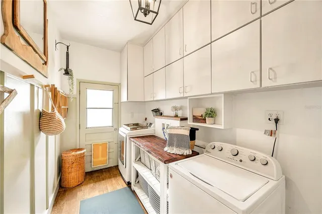 a view of a porch with furniture and a ceiling fan