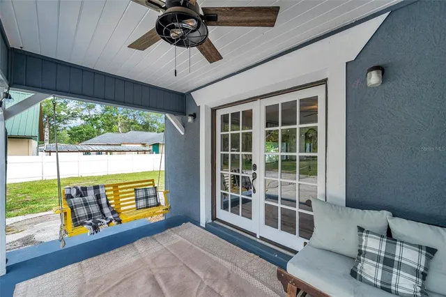 a view of a house with a backyard