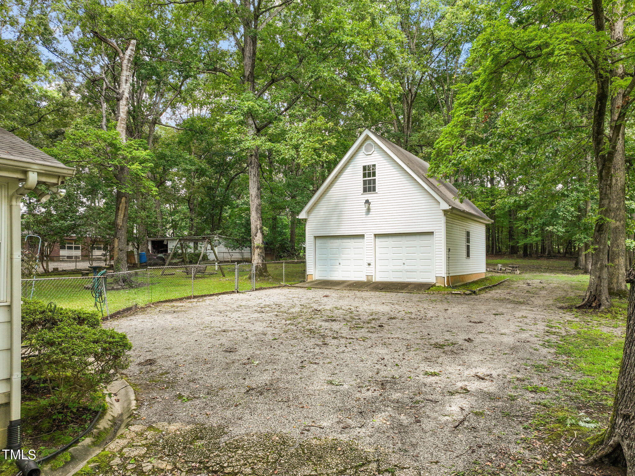 3015 Old Raleigh Road Apex, NC 27502 - Photo 37 of 47 a view of a house with backyard and trees