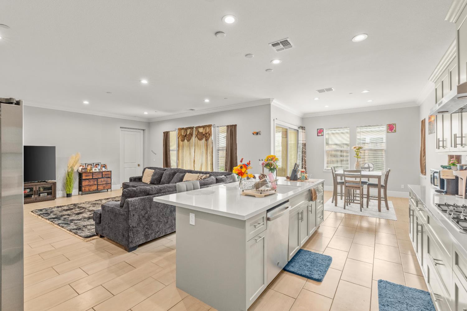 2826 Cameo Street Lodi, CA 95242 - Photo 35 of 52 a large living room with stainless steel appliances granite countertop a sink and a couch
