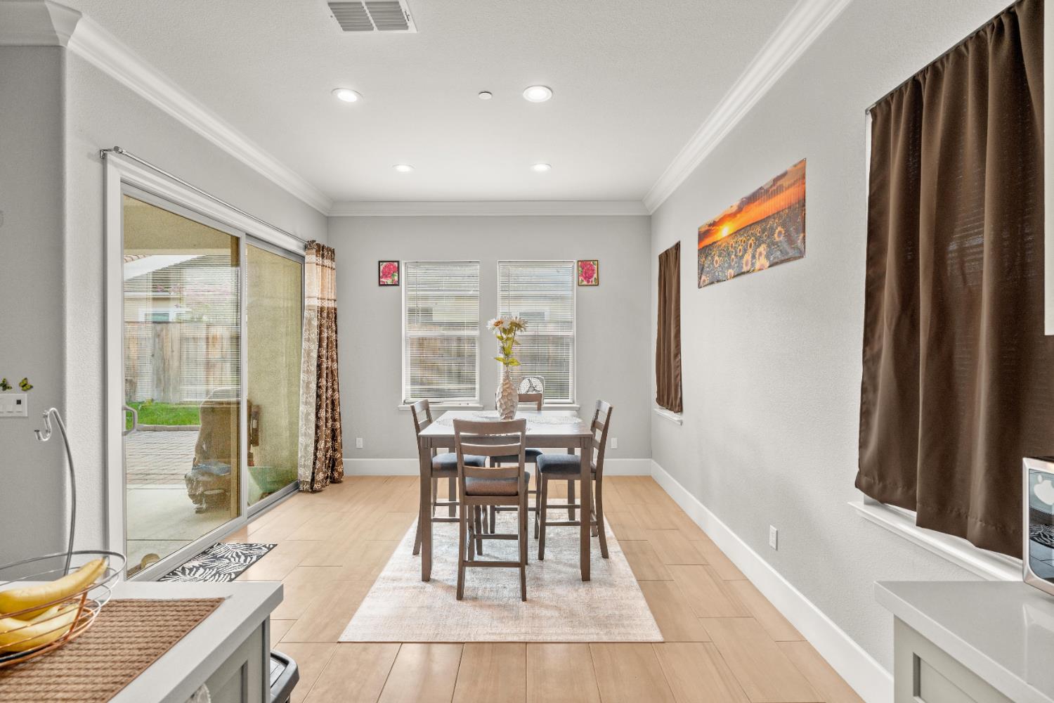 2826 Cameo Street Lodi, CA 95242 - Photo 37 of 52 a dining room with a table and chairs