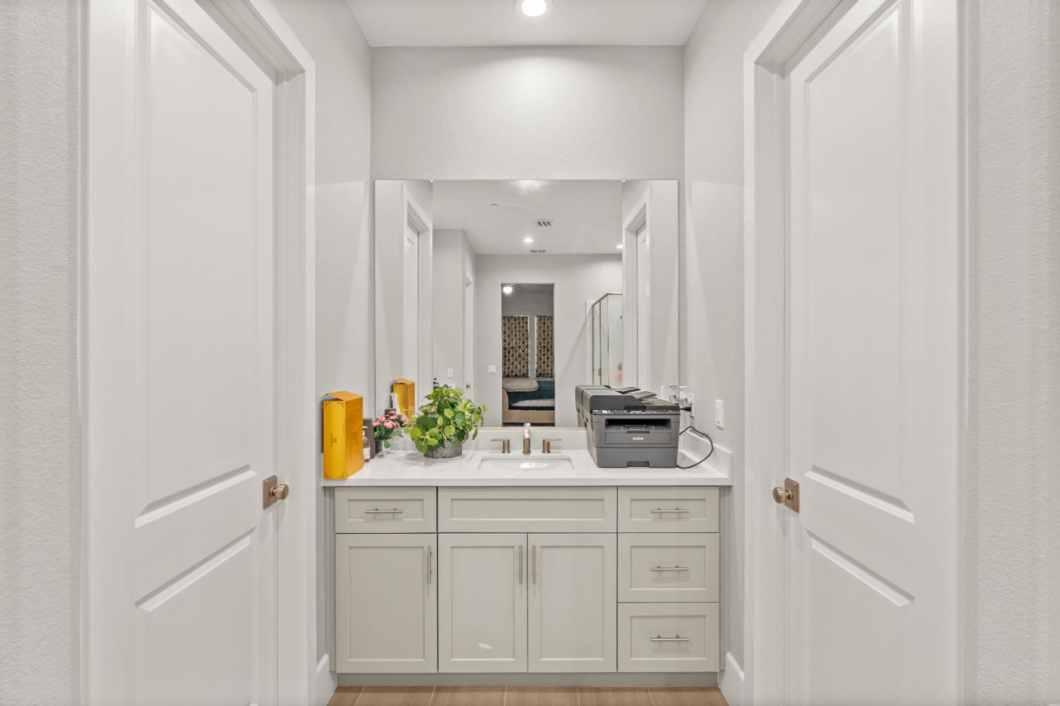 2826 Cameo Street Lodi, CA 95242 - Photo 47 of 52 a bathroom with a sink and a mirror