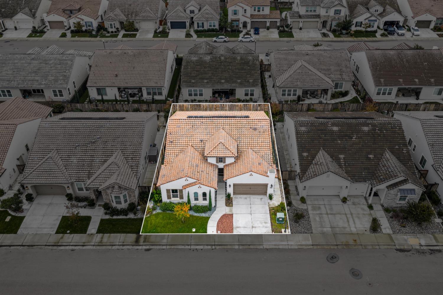 2826 Cameo Street Lodi, CA 95242 - Photo 8 of 52 an aerial view of a house with a garden and parking space