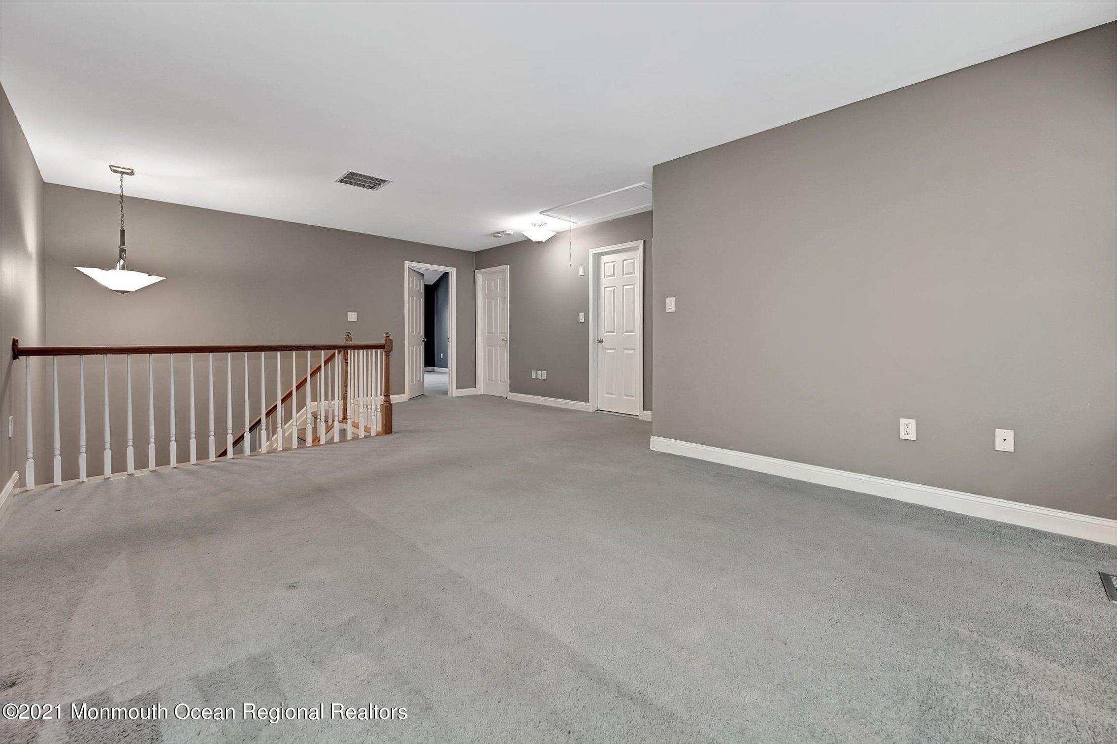 42 Alpine Road, Unit 163 Holmdel, NJ 07733 - Photo 24 of 33 27-Family room