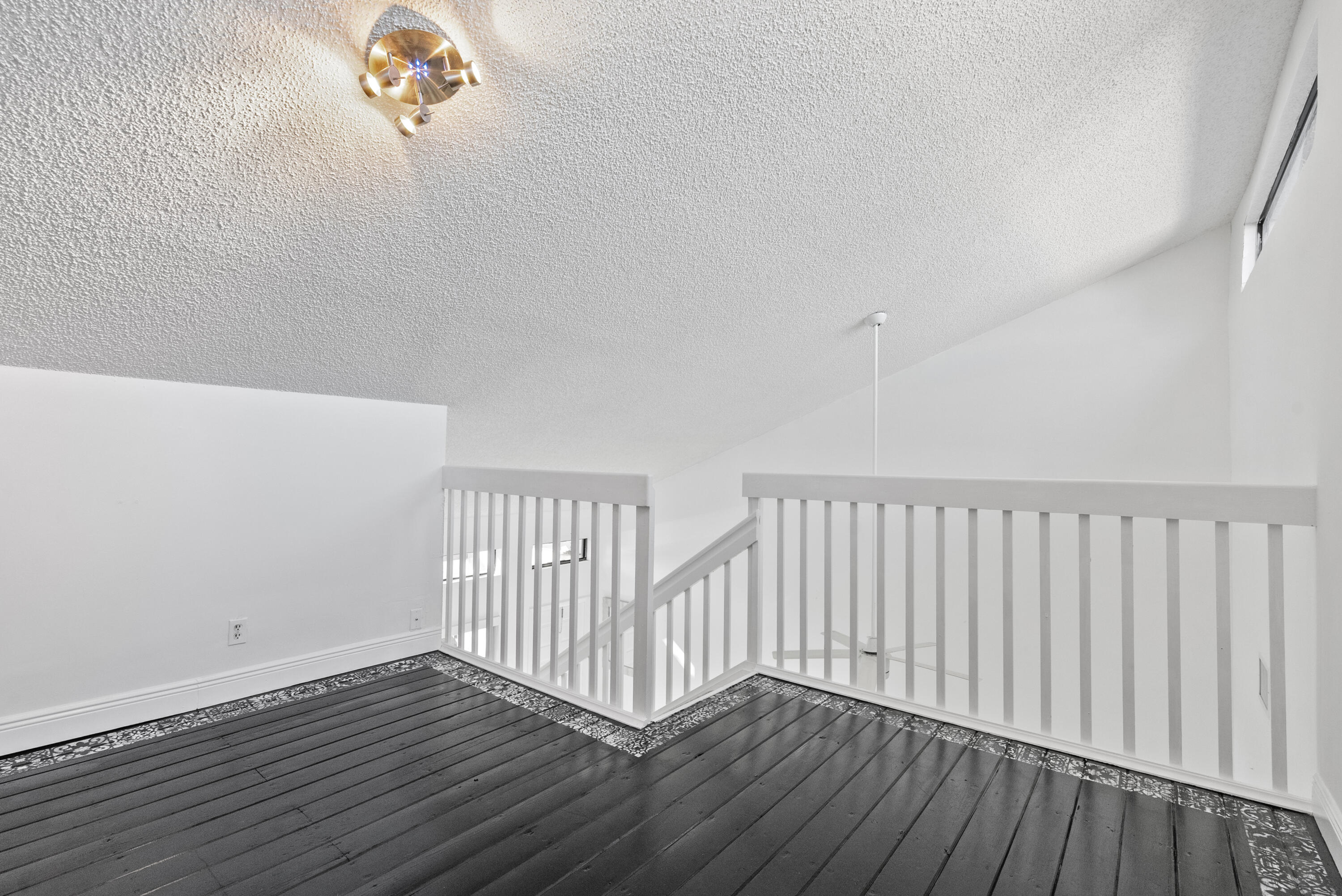 5110 Nesting Way, Unit B Delray Beach, FL 33484 - Photo 12 of 29 a view of a room with wooden floor
