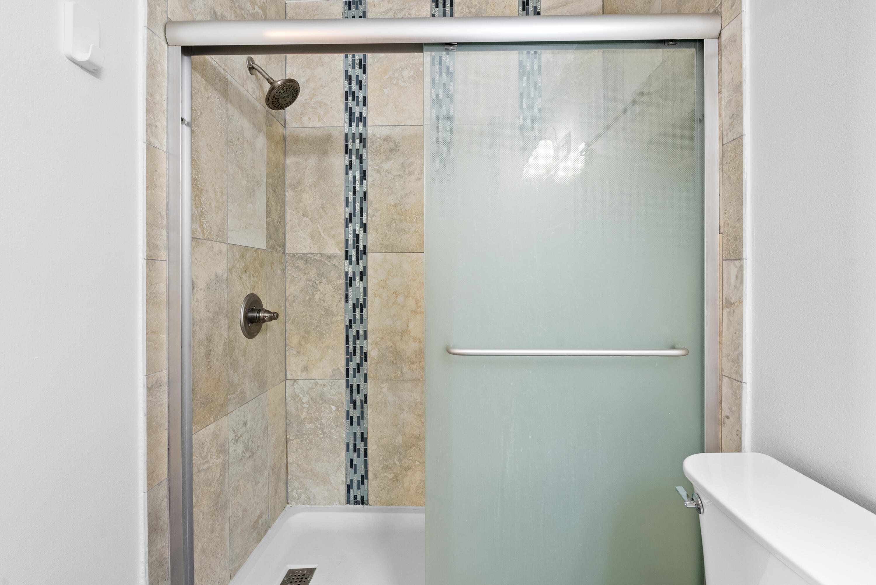5110 Nesting Way, Unit B Delray Beach, FL 33484 - Photo 21 of 29 a bathroom with a shower and toilet