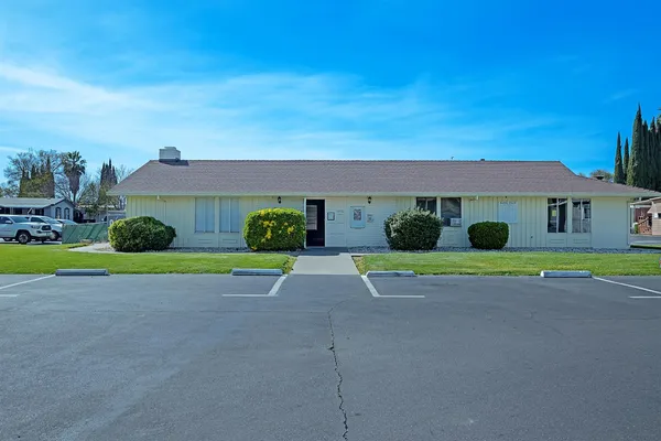 a house with yard in front of it