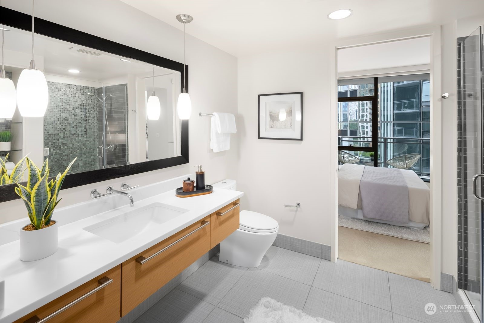 820 Blanchard Street, Unit 708 Seattle, WA 98121 - Photo 19 of 33 a bathroom with a sink a toilet and shower