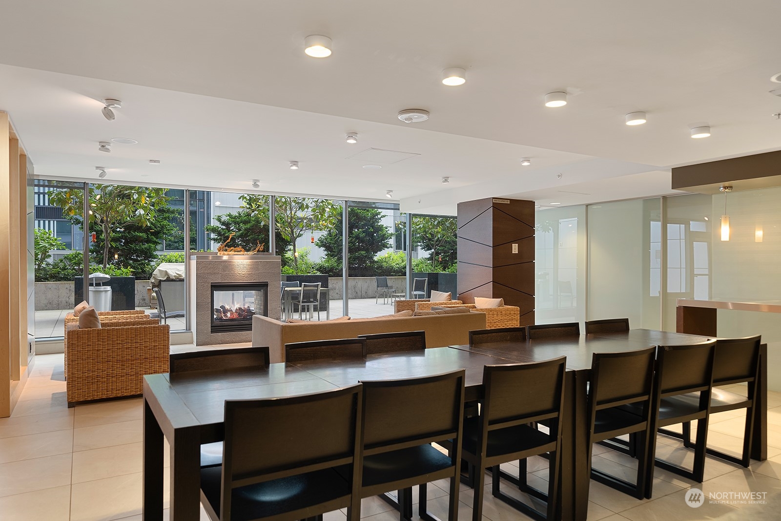 820 Blanchard Street, Unit 708 Seattle, WA 98121 - Photo 26 of 33 a dining room with stainless steel appliances a table and chairs