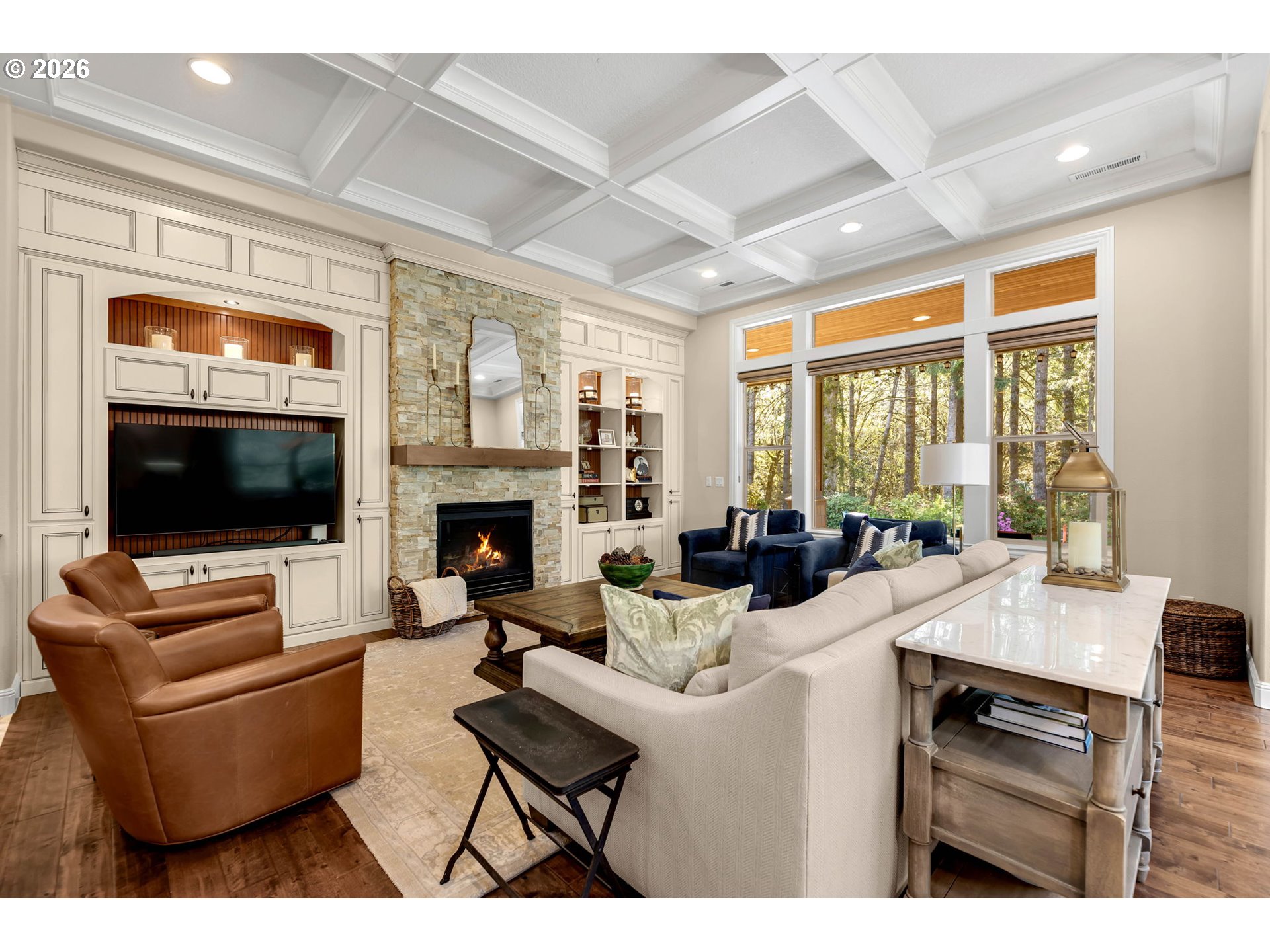 806 Northwest 35th Avenue Camas, WA 98607 - Photo 17 of 48 a living room with furniture a flat screen tv and a fireplace