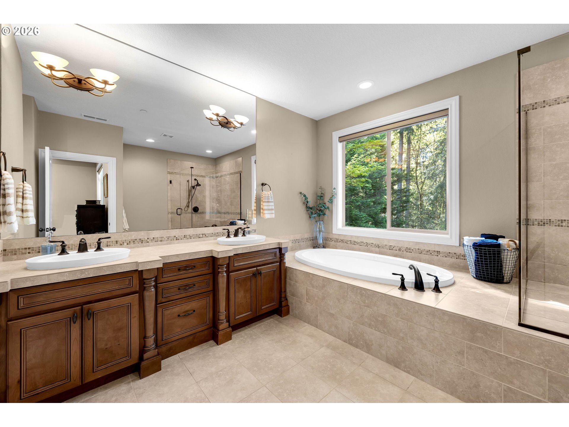 806 Northwest 35th Avenue Camas, WA 98607 - Photo 24 of 48 a spacious bathroom with a tub sink and mirror