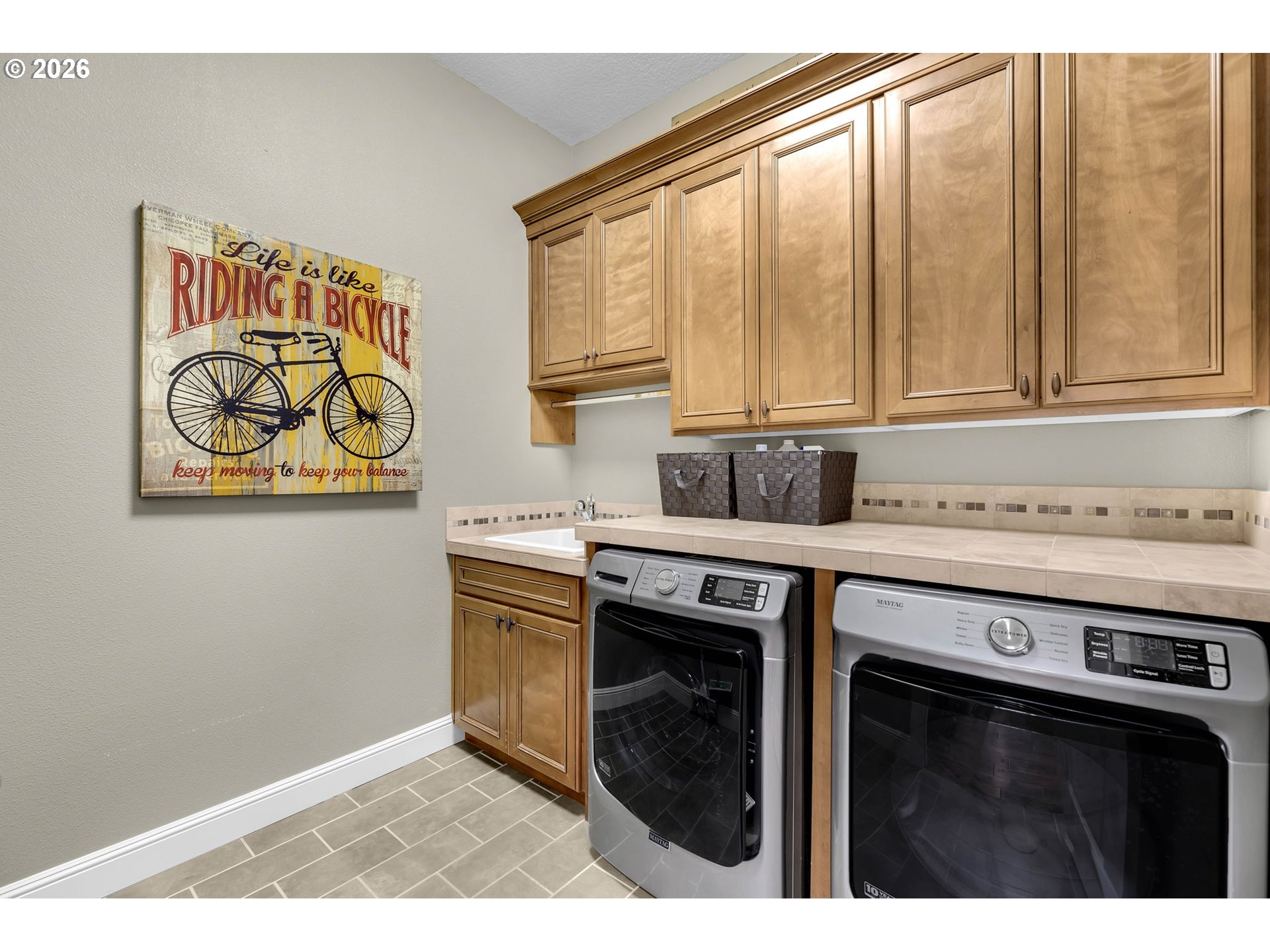 806 Northwest 35th Avenue Camas, WA 98607 - Photo 33 of 48 a kitchen with stainless steel appliances granite countertop a stove a sink and a microwave