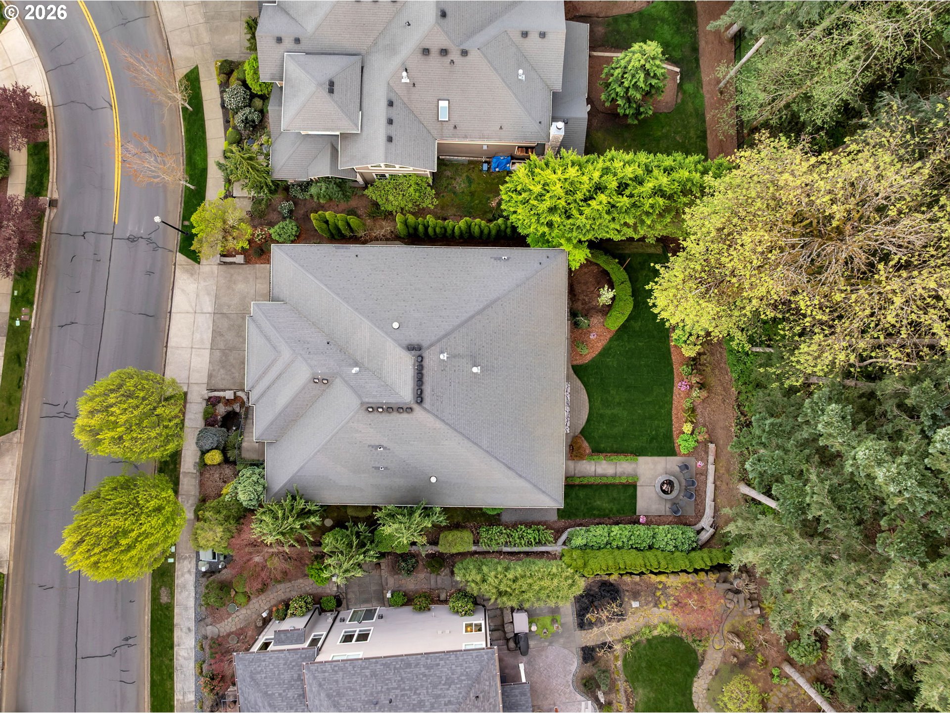 806 Northwest 35th Avenue Camas, WA 98607 - Photo 46 of 48 an aerial view of a house with large trees and a yard