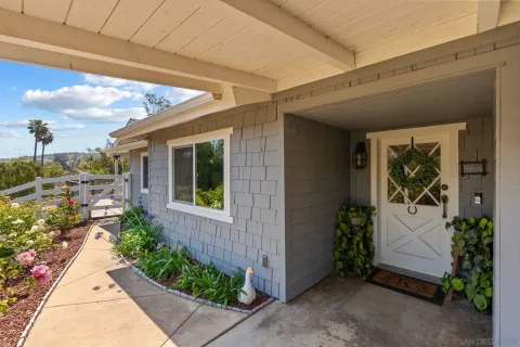 a front view of a house with a porch