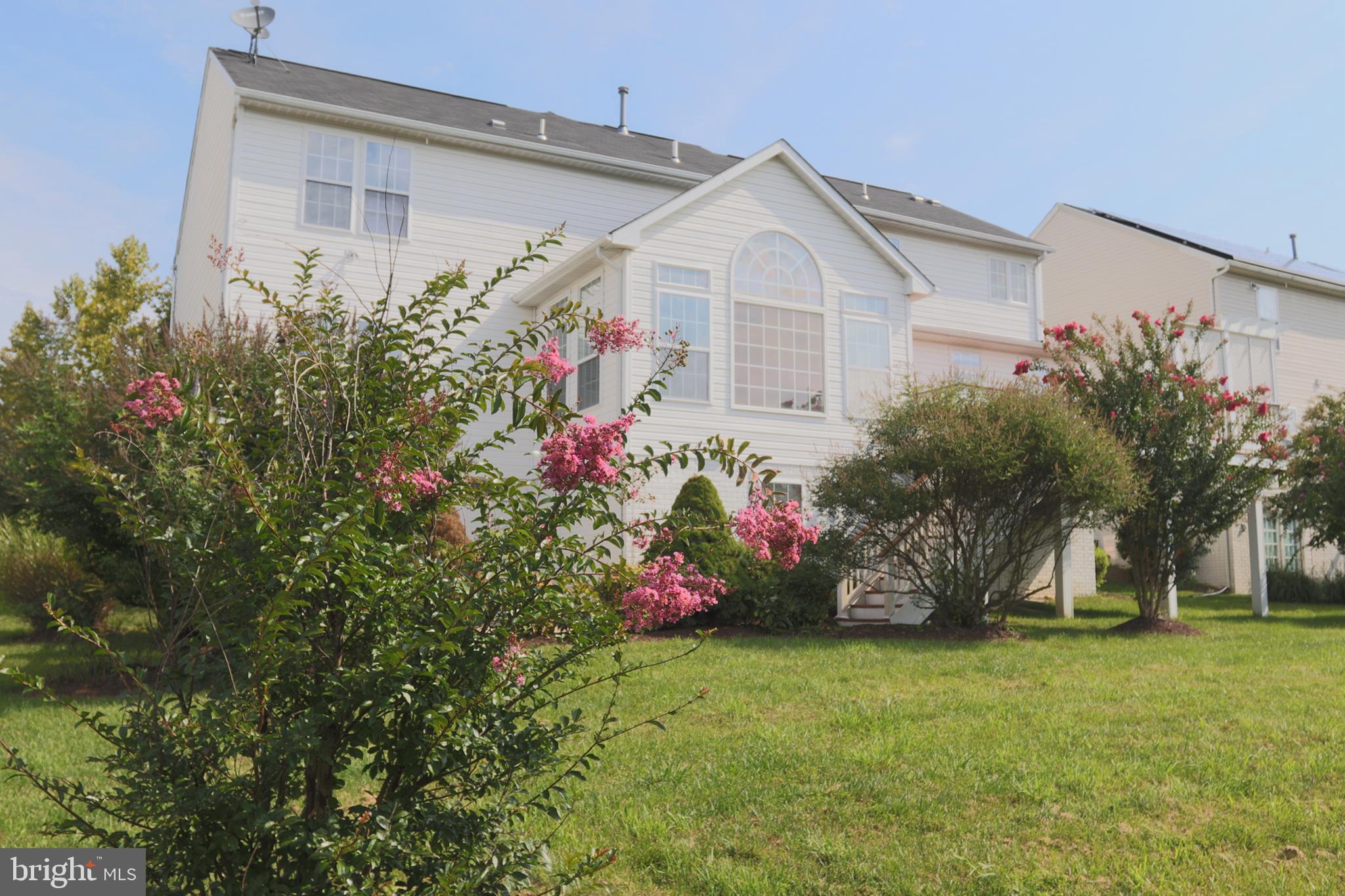 14404 Autumn Crest Road Boyds, MD 20841 - Photo 11 of 103 a front view of a house with a yard