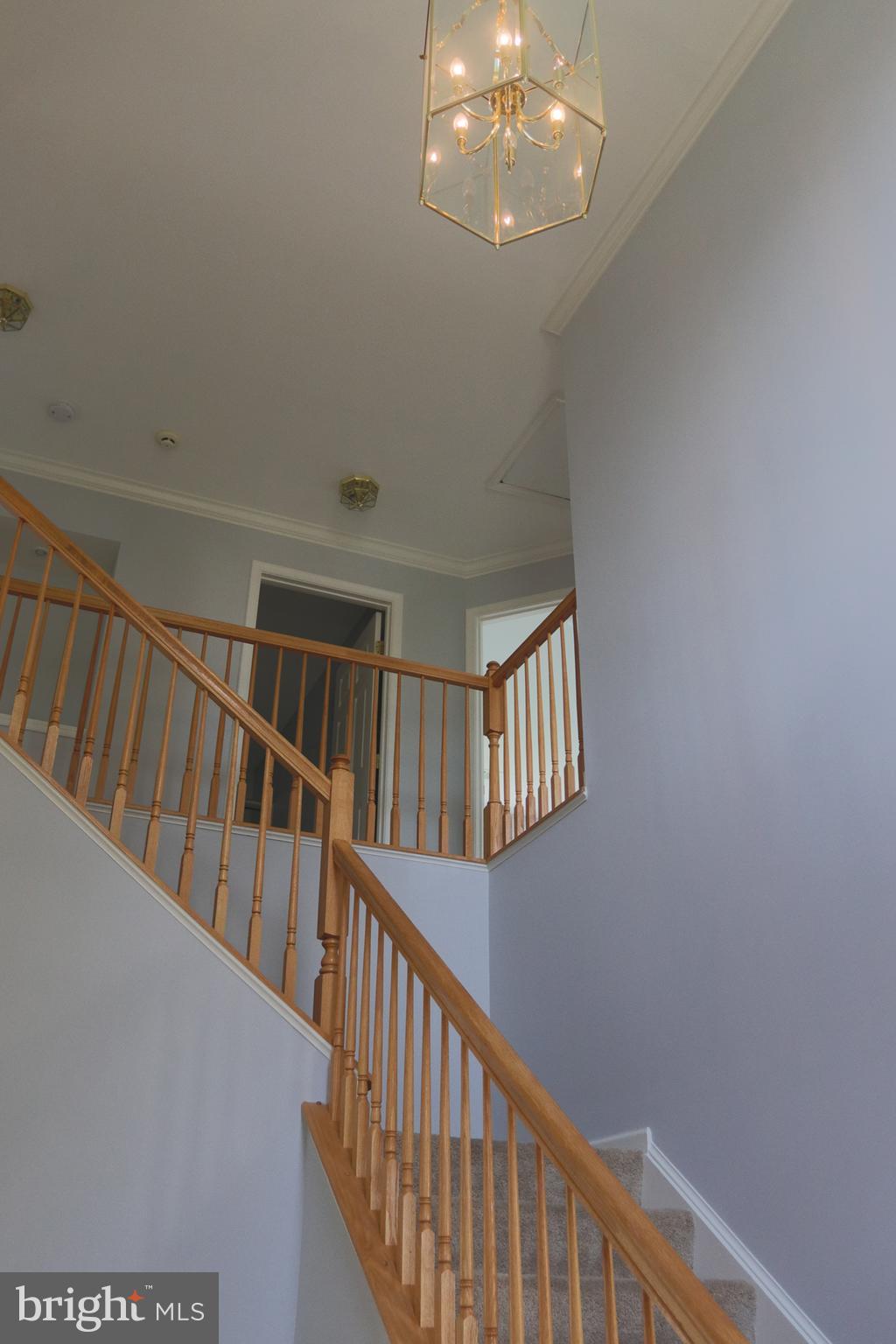 14404 Autumn Crest Road Boyds, MD 20841 - Photo 23 of 103 a view of staircase with railing and white walls