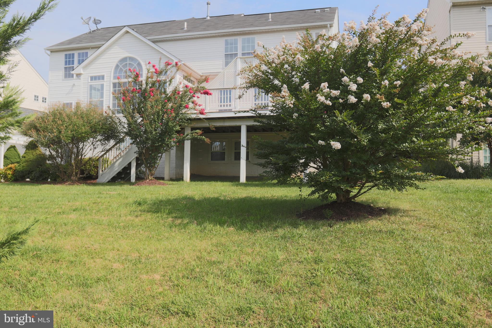 14404 Autumn Crest Road Boyds, MD 20841 - Photo 5 of 103 a front view of a house with garden