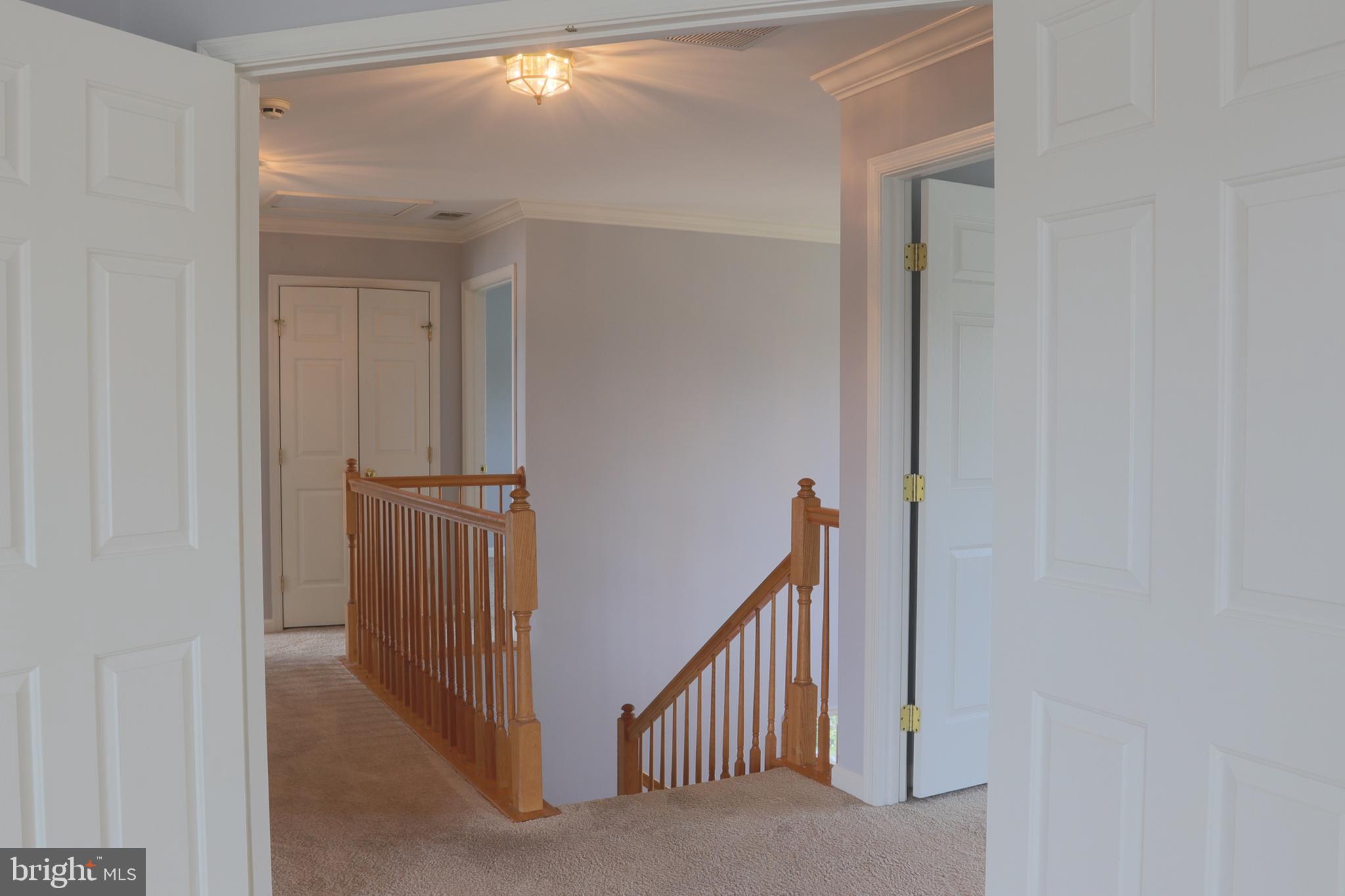 14404 Autumn Crest Road Boyds, MD 20841 - Photo 44 of 103 a view of a hallway with a door